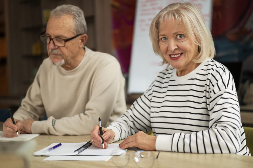 a man and woman sitting at a table